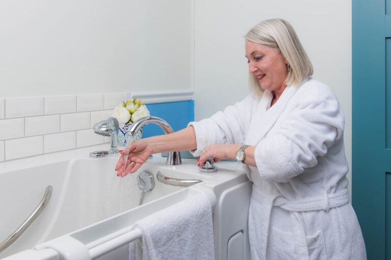 woman filling her walk-in tub