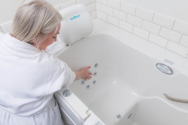 woman using the hydrotherapy jets