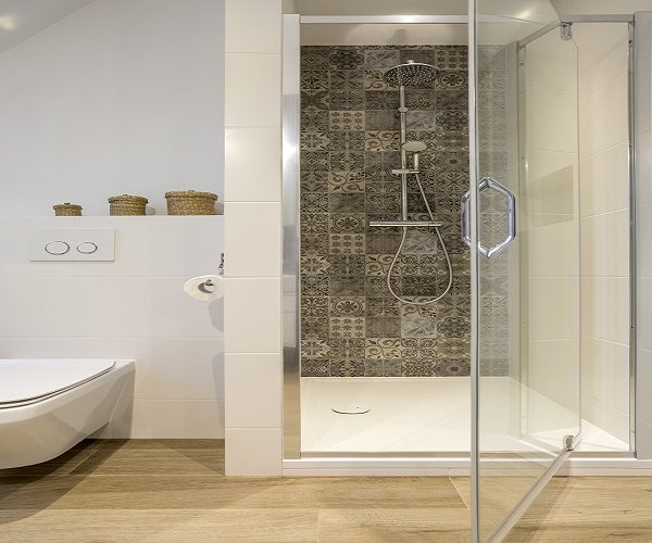 modern shower with a pivot glass door