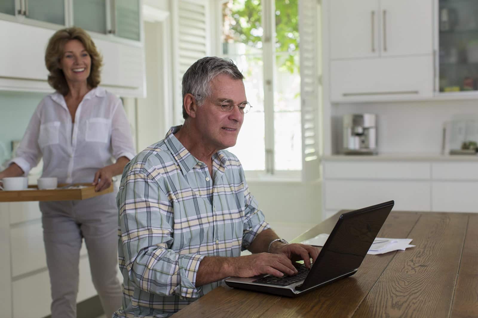 Elderly Couple researching walk-in tubs