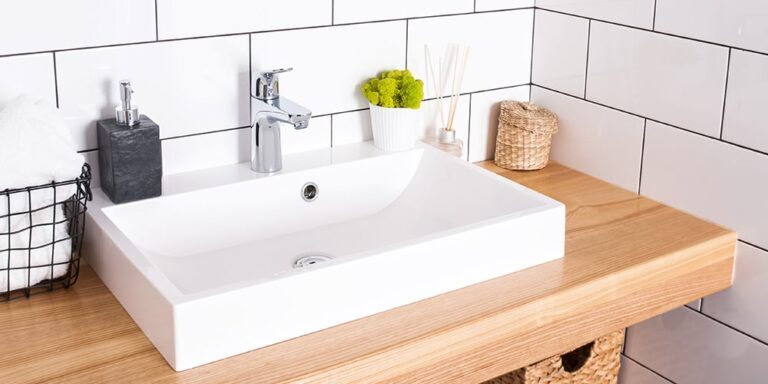 modern sink with a wooden vanity
