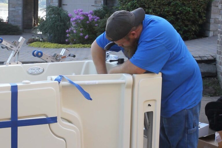 worker fixing the walk-in tub