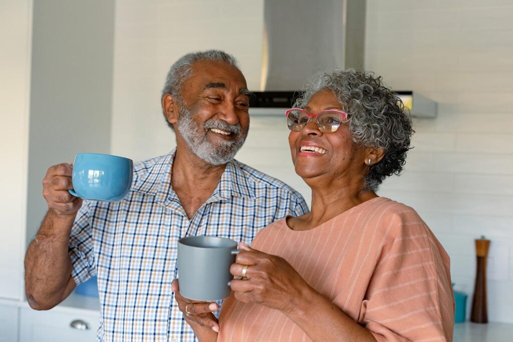 elderly couple drinking coffee