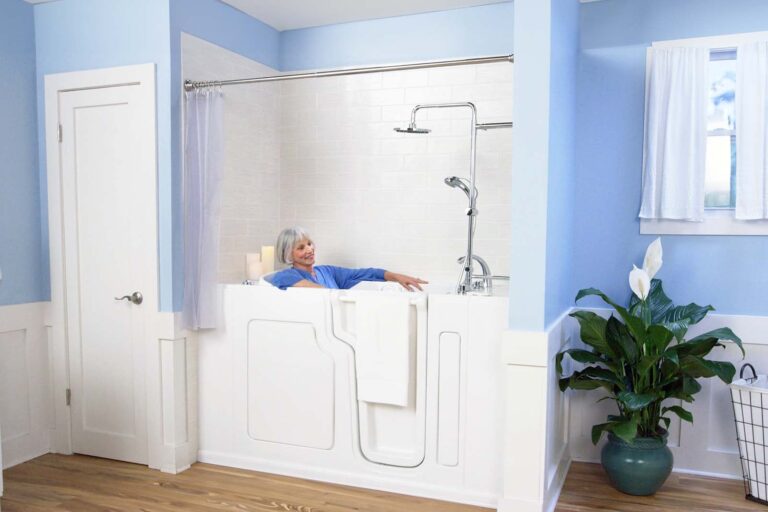 woman sitting in her walk-in tub shower combo with a shower curtain