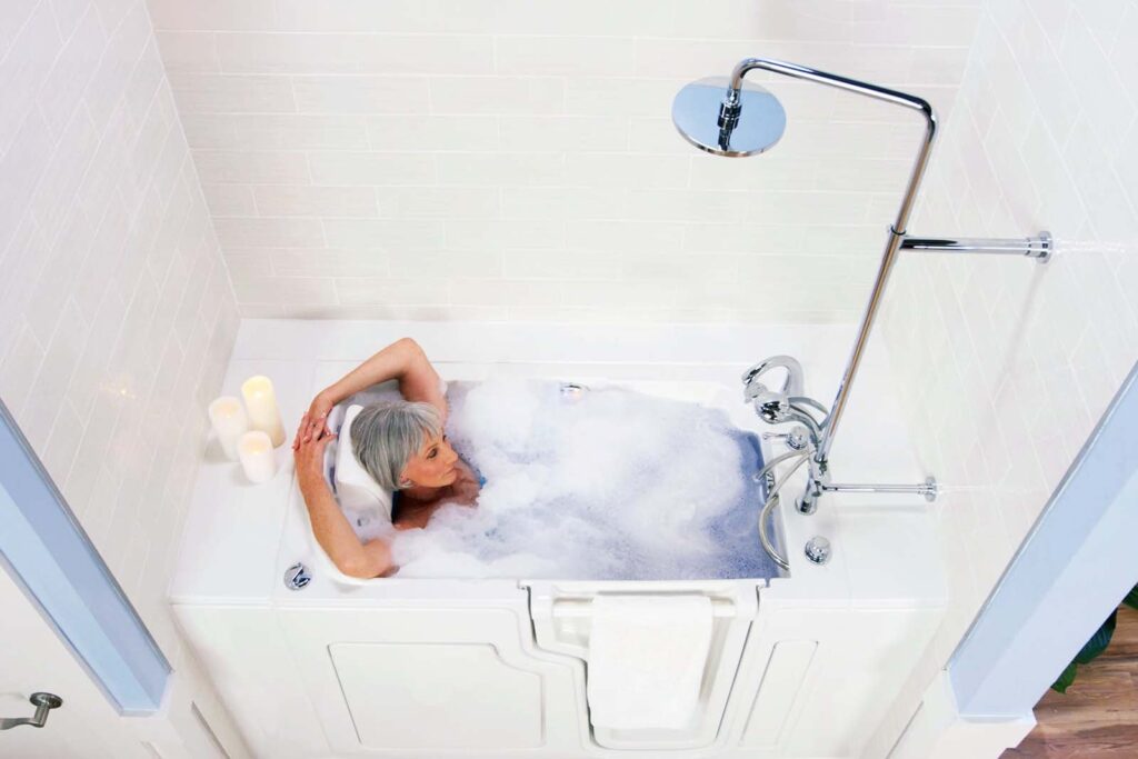 woman bathing in her walk-in tub shower combo