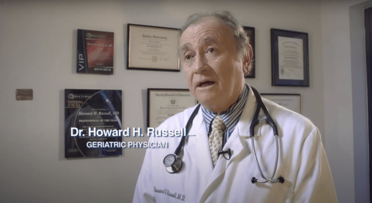 Doctor Howard Russell explaining benefits of a walk-in tub