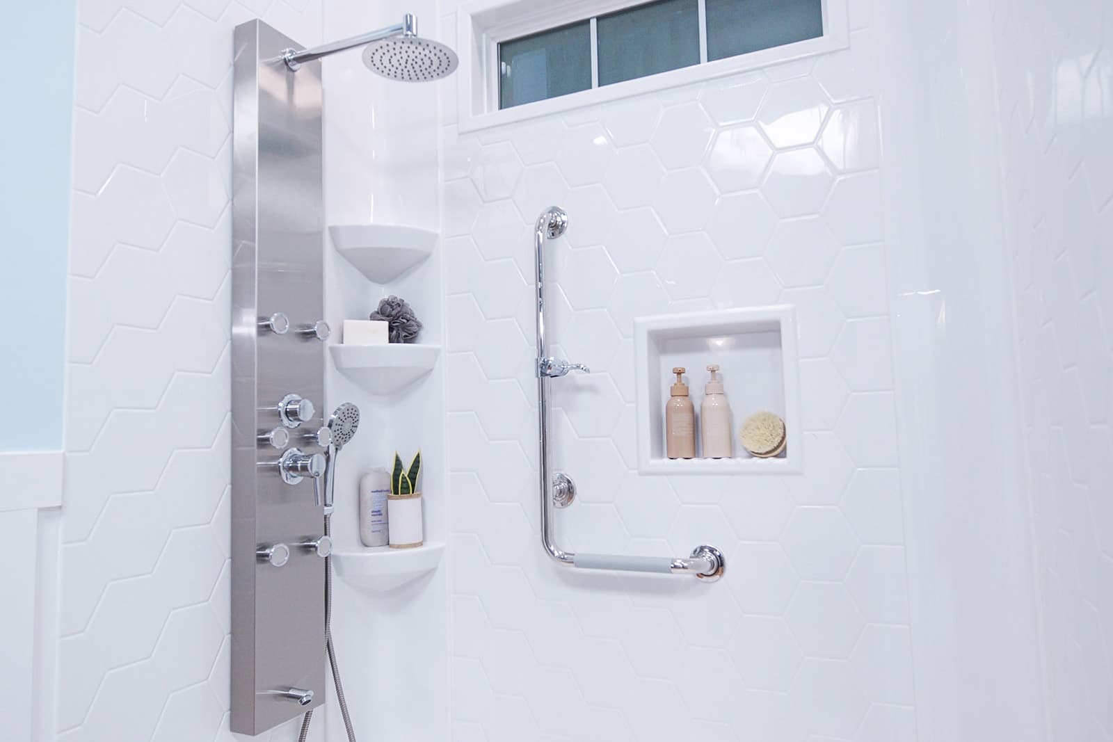 l-shaped grab bar in a walk-in shower