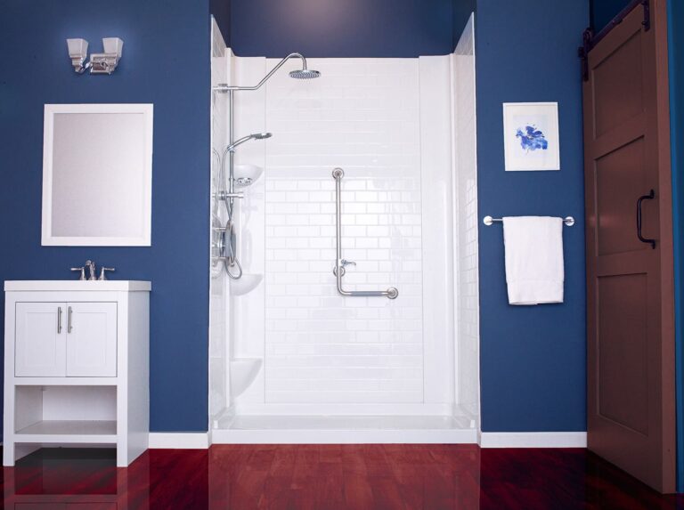 new walk-in shower with white tiled walls and l-shaped grab bar