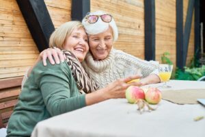 Senior woman drinking orange juice